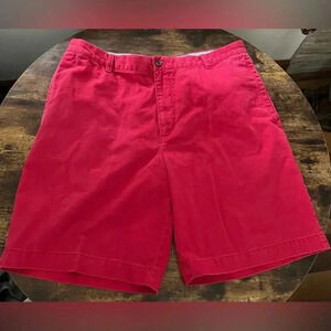 IZOD | men’s red flat front shorts. Size: 38​
